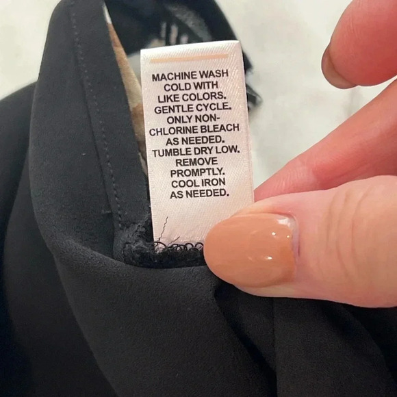 Versona loose fitting sleeveless top, black with fall color floral detail at hem - Picture 8 of 13